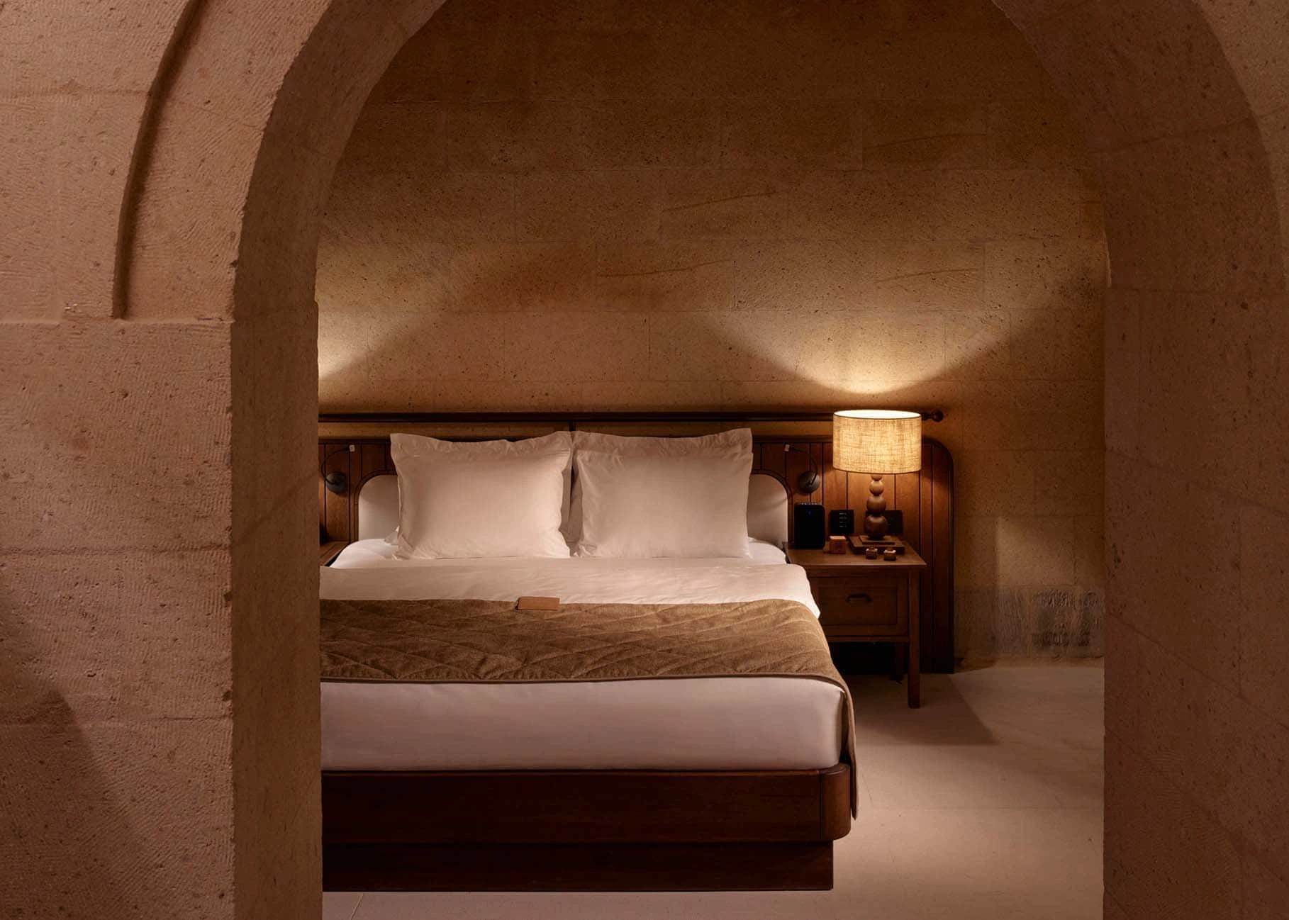 Spacious stone bedroom in an Argos in Cappadocia suite