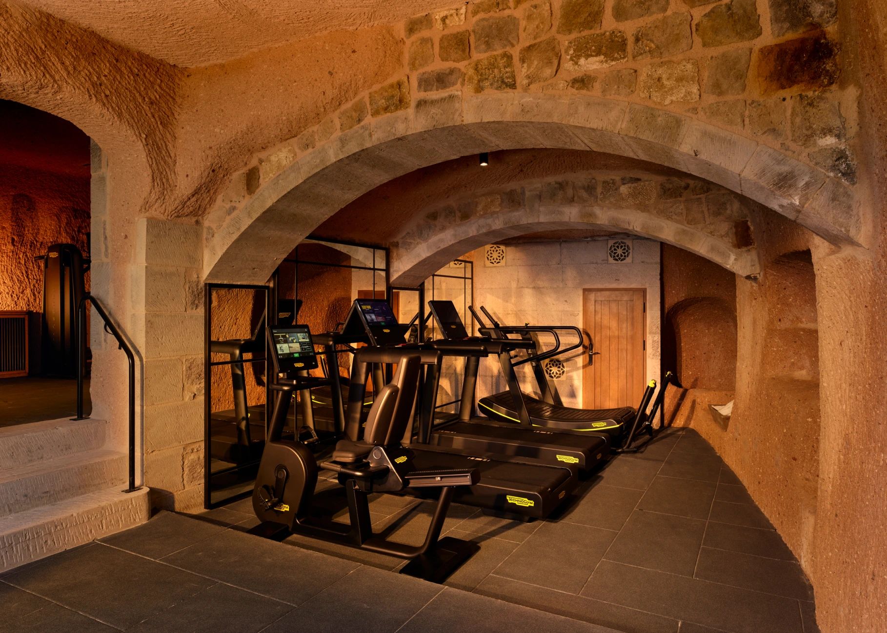 Treadmill and cave architecture at Argos Gym, Argos in Cappadocia