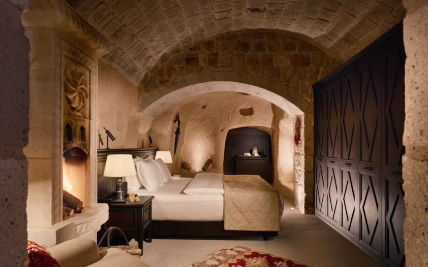 Standard Room warm stone interior at Argos in Cappadocia