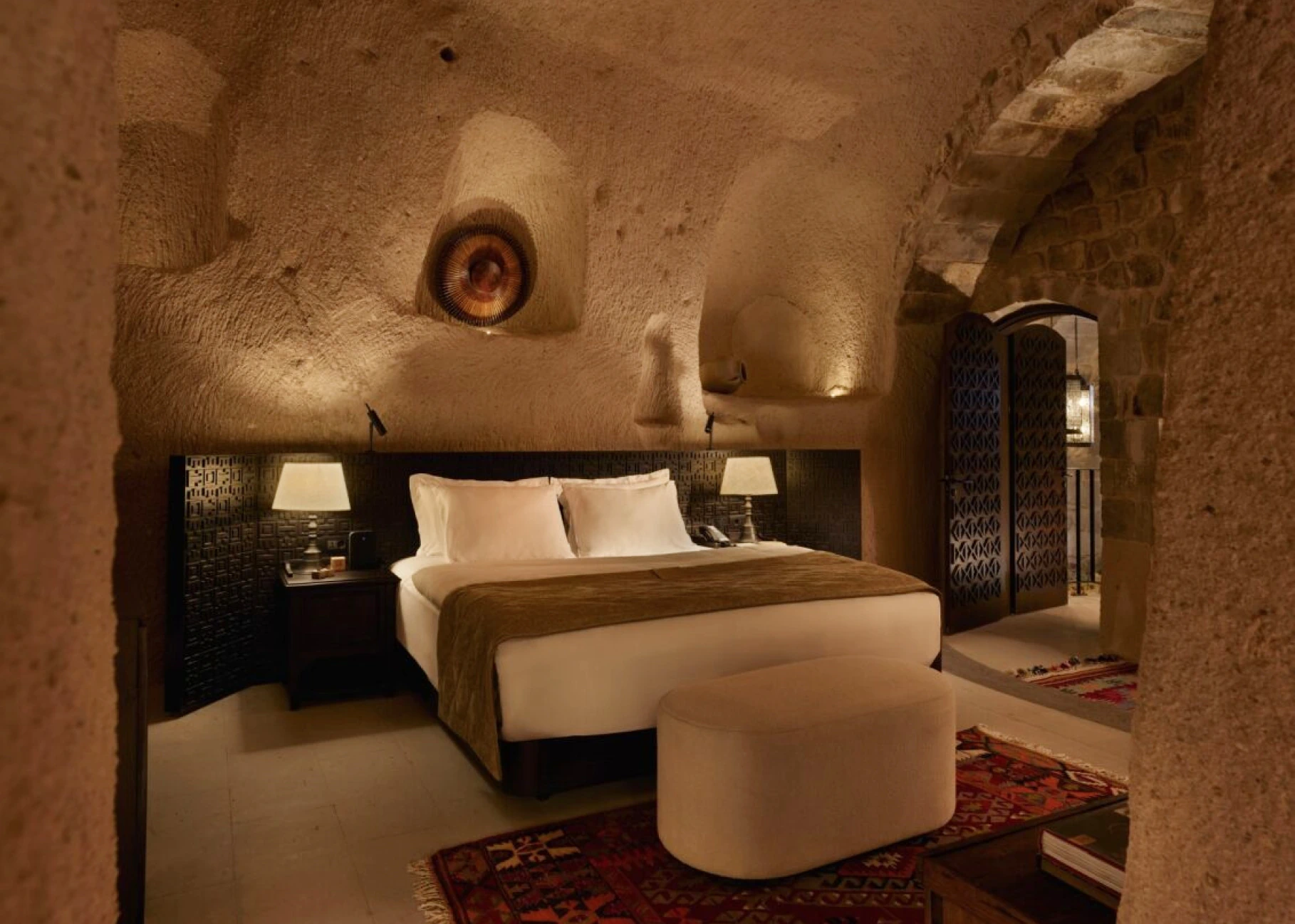 Stone arch and wood detail in an Argos in Cappadocia room