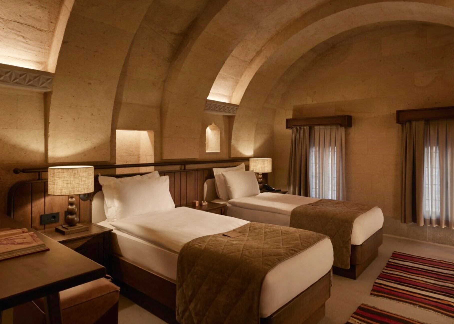 Vaulted stone bedroom in an Argos in Cappadocia suite