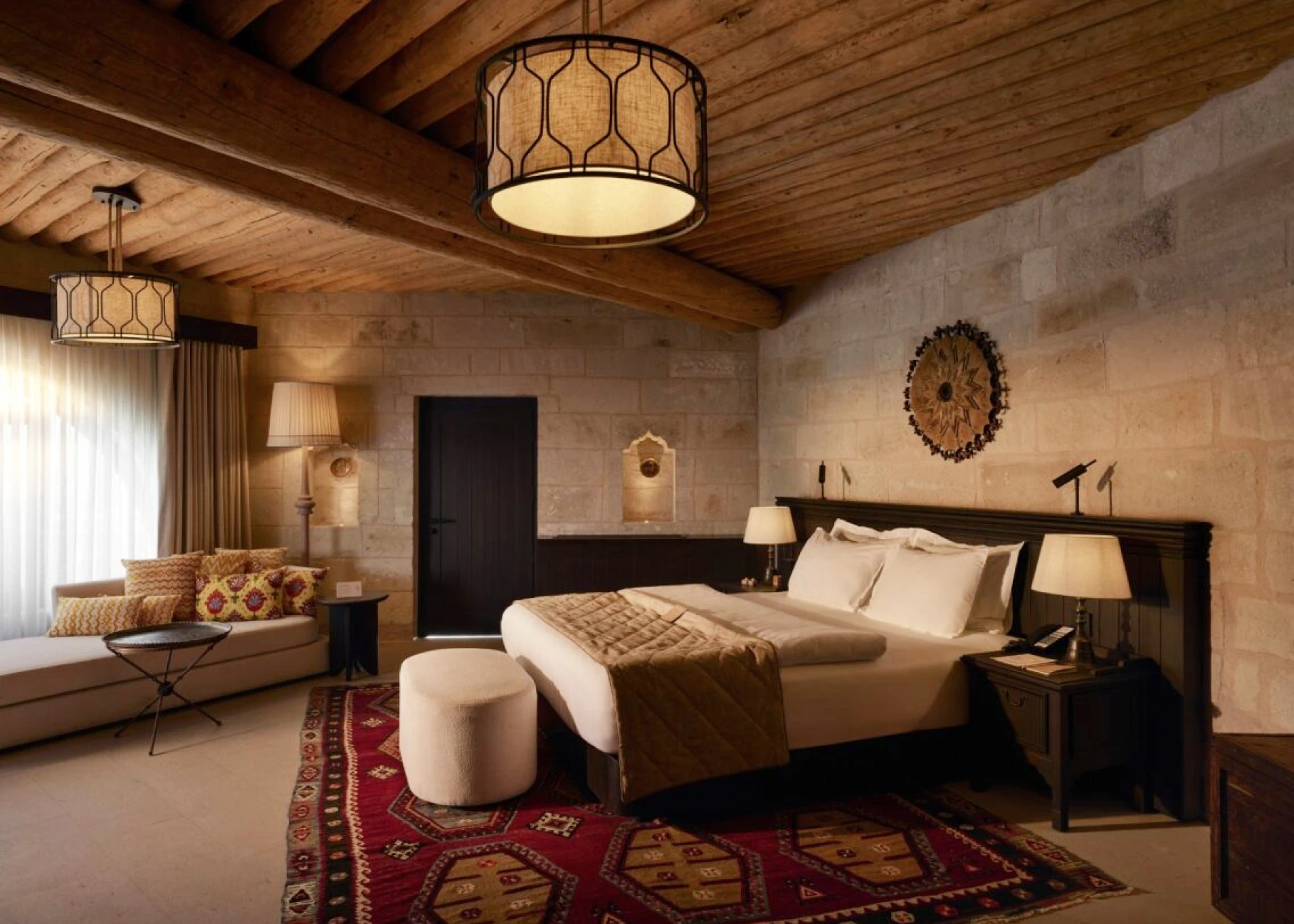 Cosy bed layout in an Argos in Cappadocia cave room
