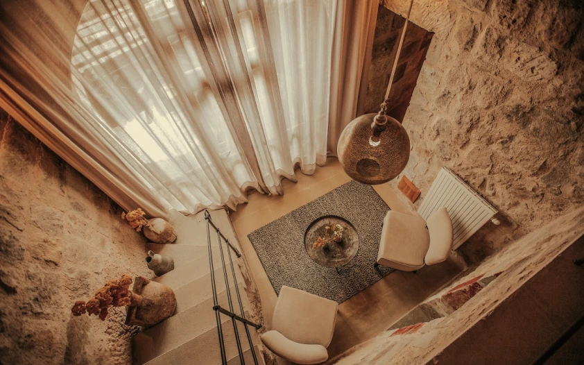 Jacuzzi Suite bedroom with stone arches at Argos in Cappadocia